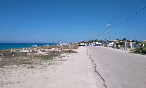 Beachside road across Agios Ioannis Beach