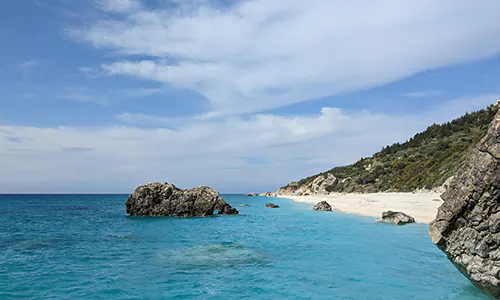 The rocks from which Megali Petra Beach takes its name