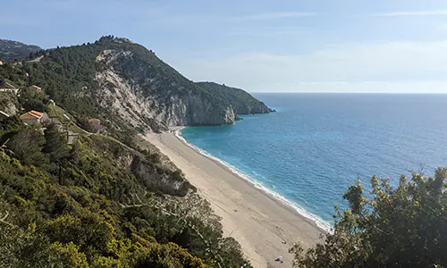 First view of Milos Beach from the top of the hill