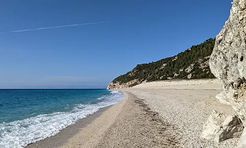 By the tranquil shores of Milos Beach